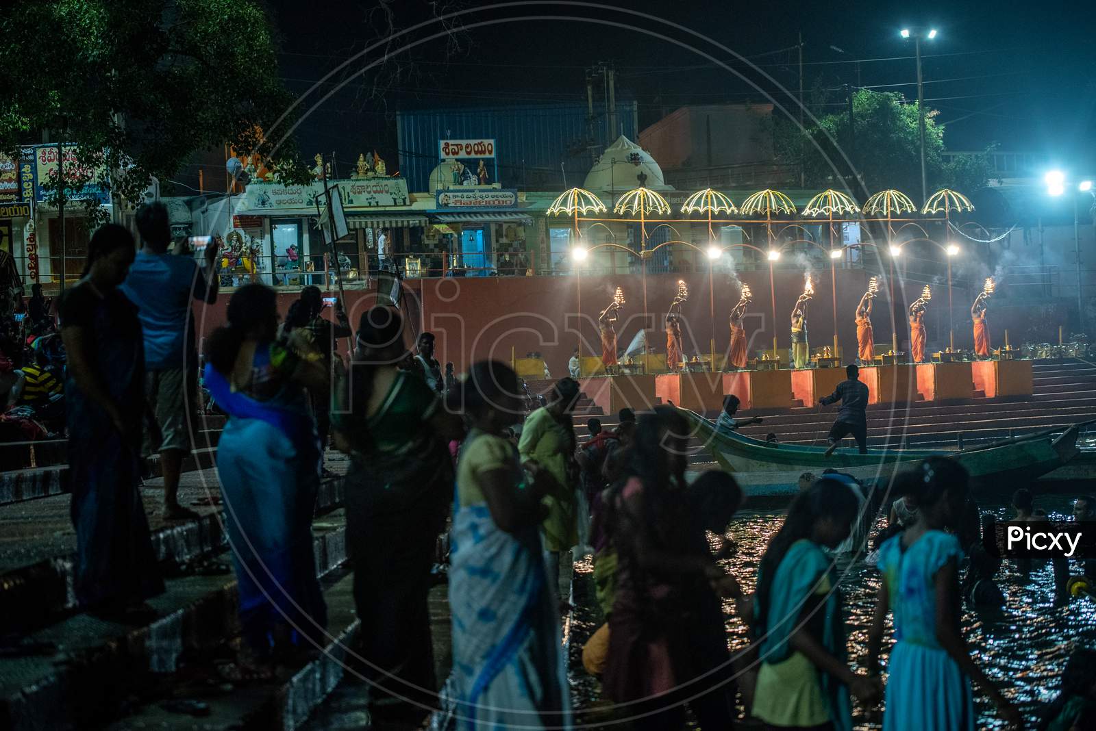 People bath in River Godavari during Harathi is being offered