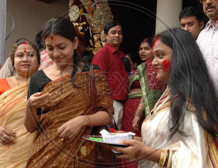 Two Women devotees during durga puja
