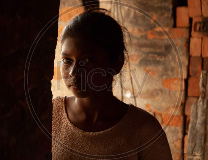 Indian Rural Village Girl At a House