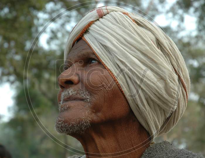 Side view of Indian Old Man with white turban