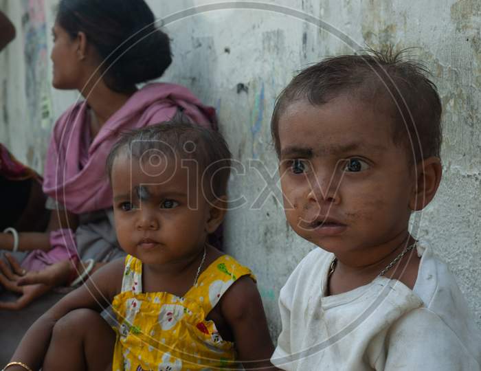 Children With Parents On The Streets Of  Kolkata
