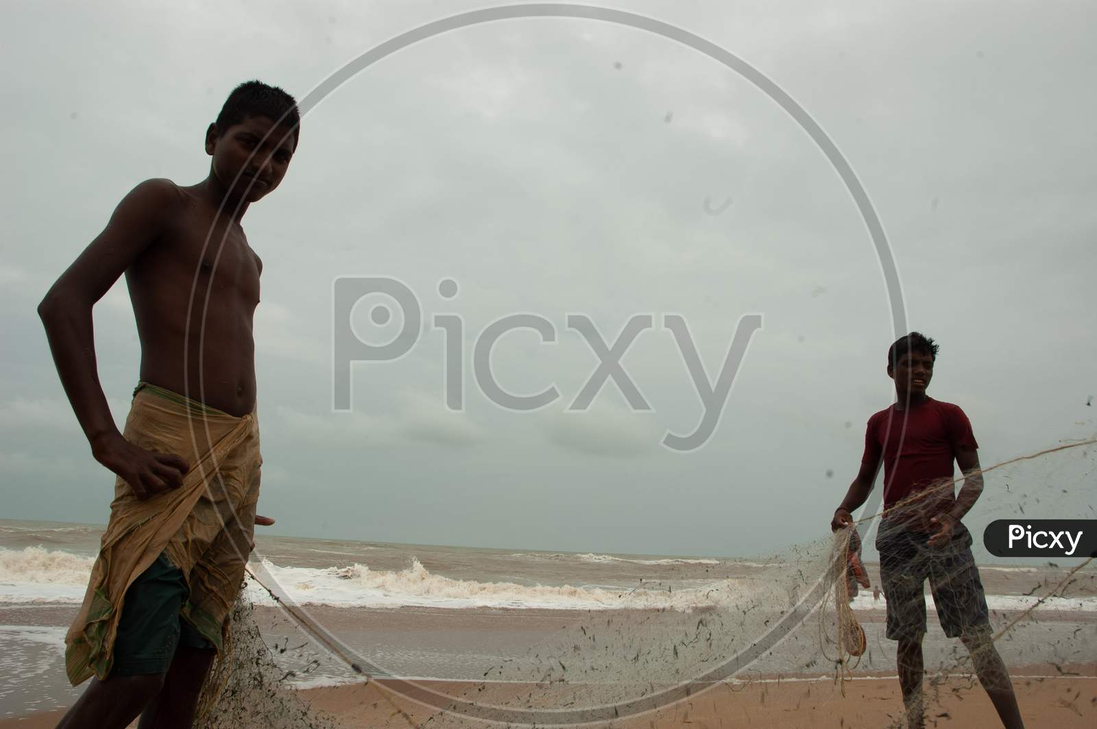 View of local fishermen with cast nets