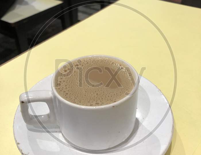 Coffee Or Tea Cup On an Cafe Table Background