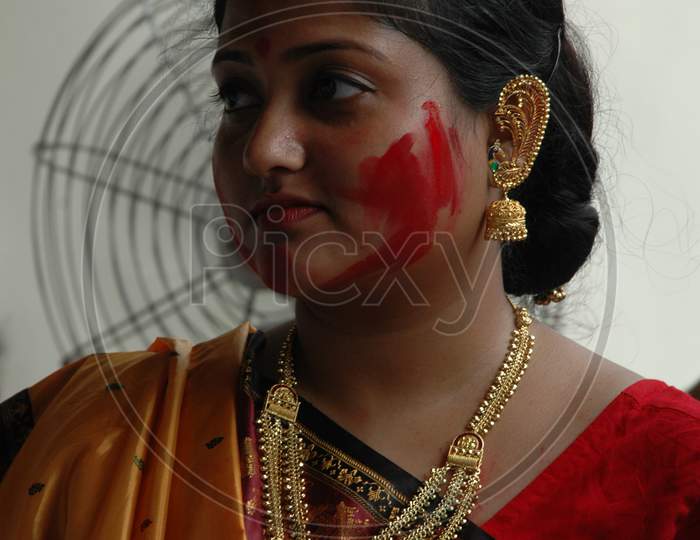 Indian woman in tradtional attire during Durga Puja