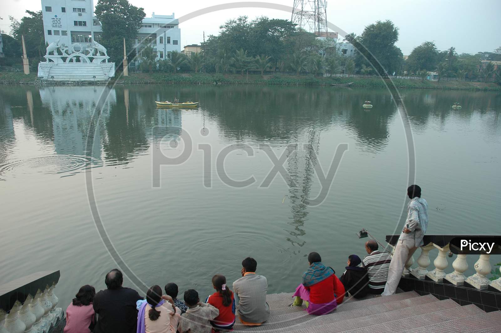 Tourists enjoying the river view in Murshidabad