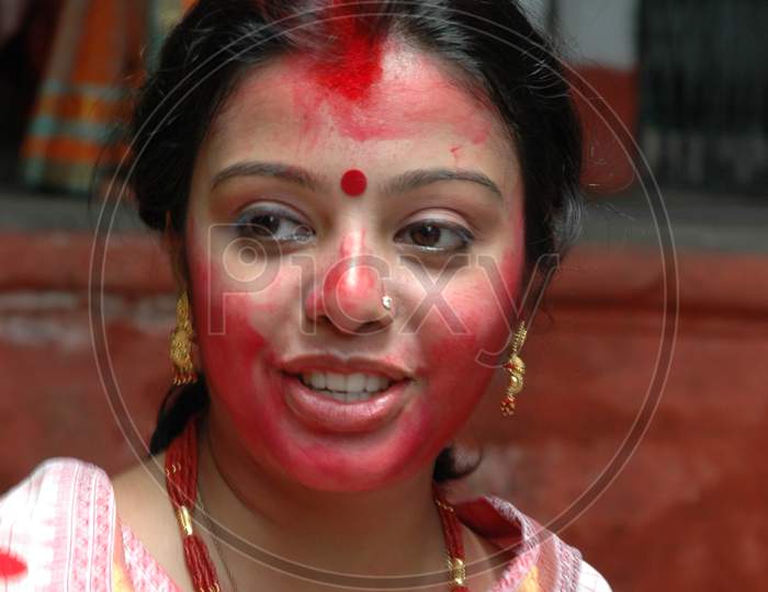 Indian Woman with sindhura during Durga Puja