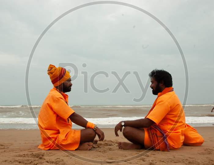 Two Indian Monks having a conversation
