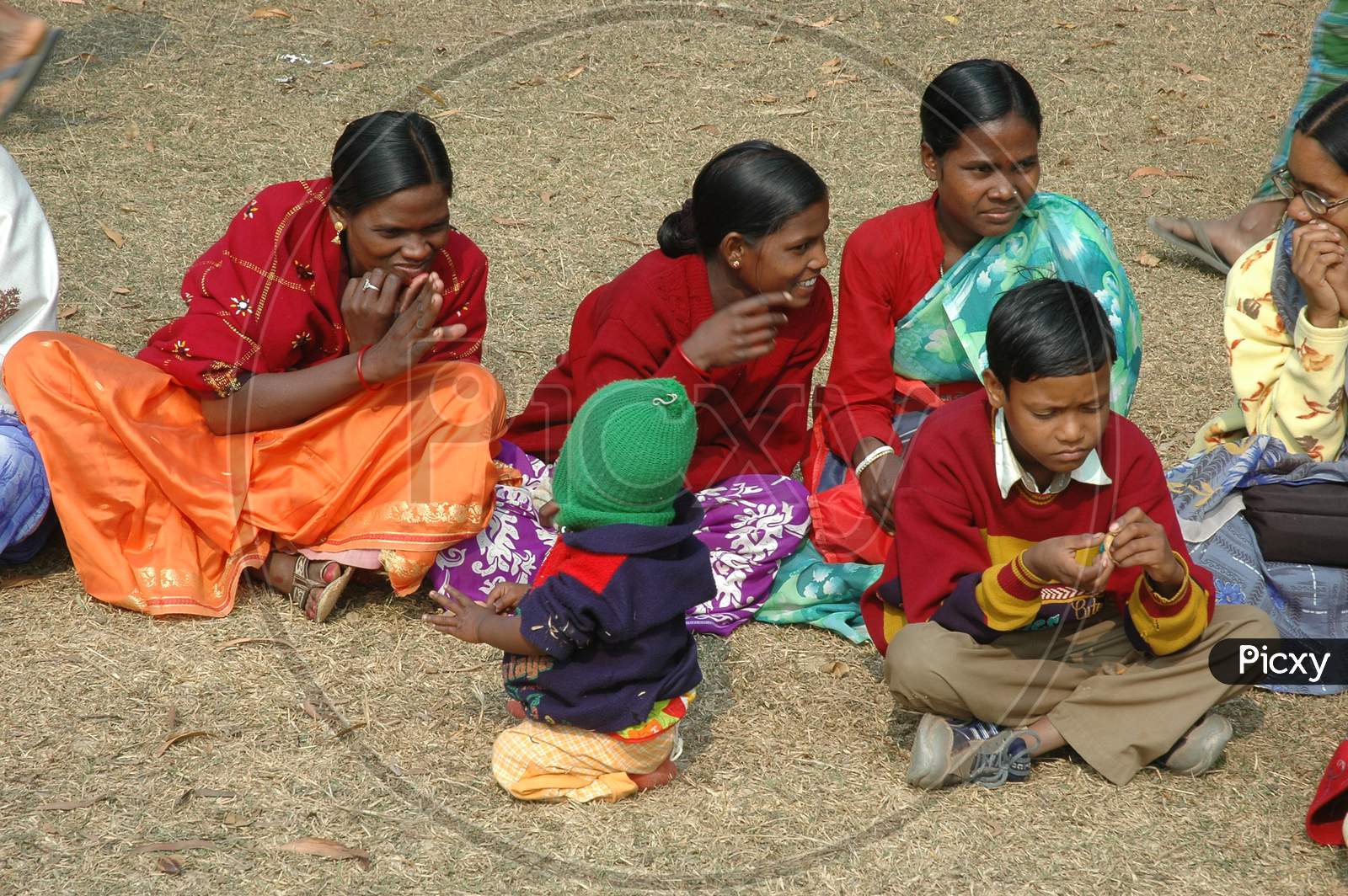Indian Tribal women sitting on the ground