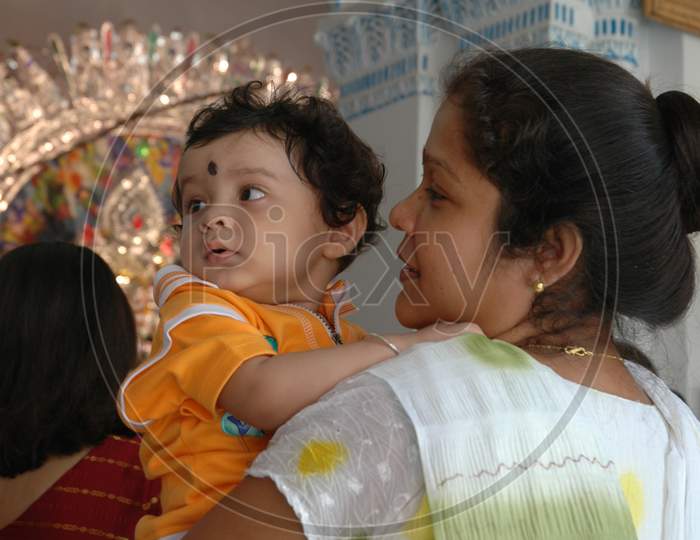 Indian Mother holding her baby