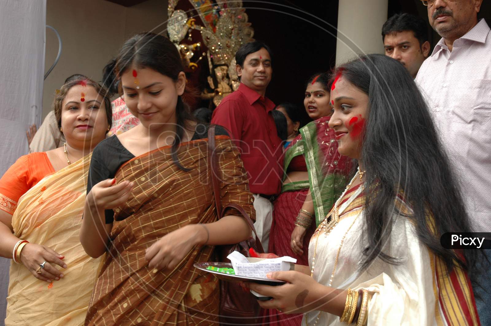 Two Women devotees during durga puja