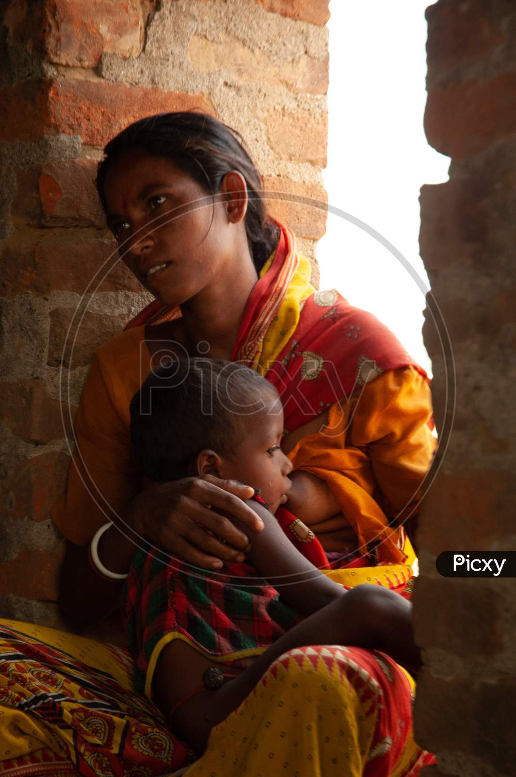 Image Of Indian Mother Feeding Baby At A Rural Village LX006525 Picxy