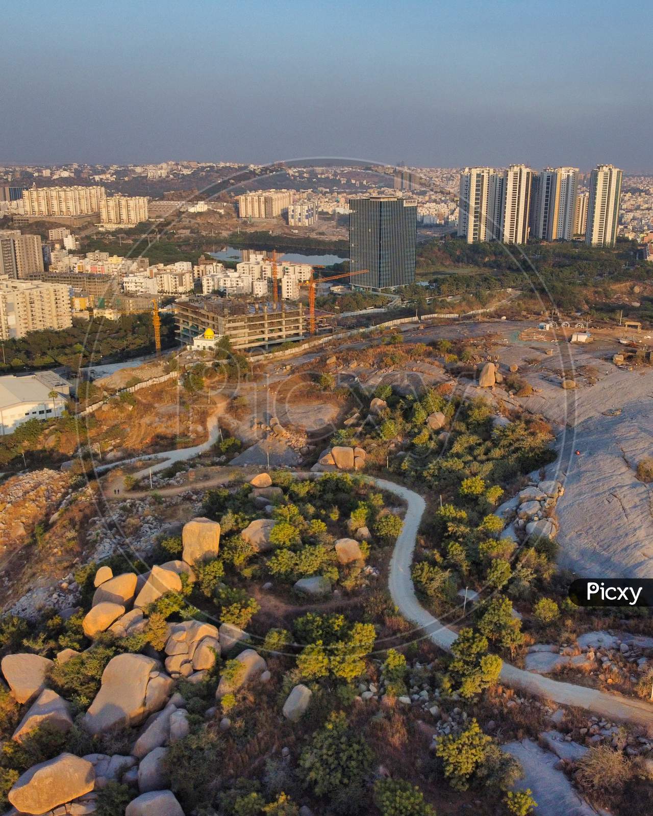 Aerial  View Of Rock Hills And high Rise Corporate buildings  At Kajaguda Hills