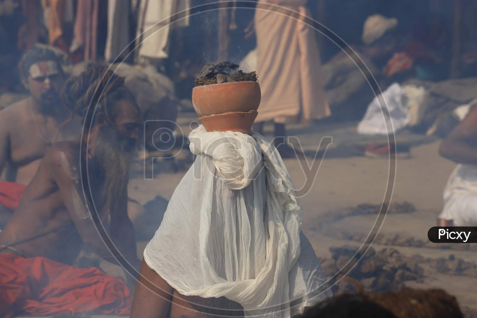 Indian Naga Sadhu Performing Pooja At Prayagraj During  Magh Mela 2020
