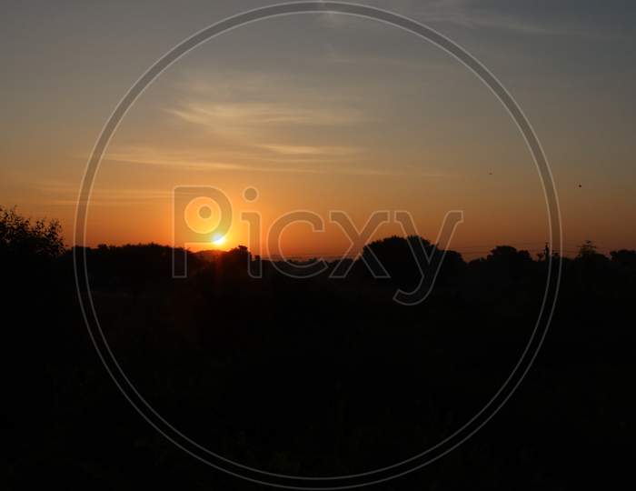 Photography Of Silhouette In Sun Rise With Sun And Sun Light Background