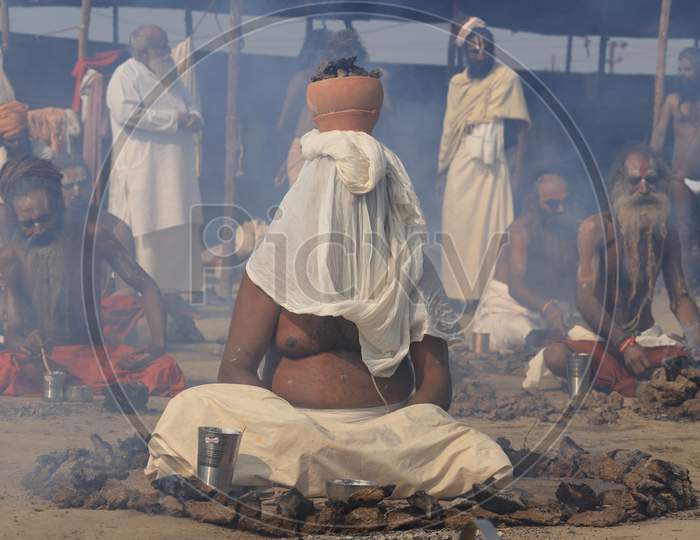 Indian Naga Sadhu Performing Pooja At Prayagraj During  Magh Mela 2020