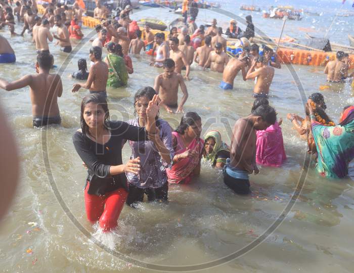 Indian Hindu Devotees  Taking Bath In Triveni Sangam River During  Magh Mela in Prayagraj 2020