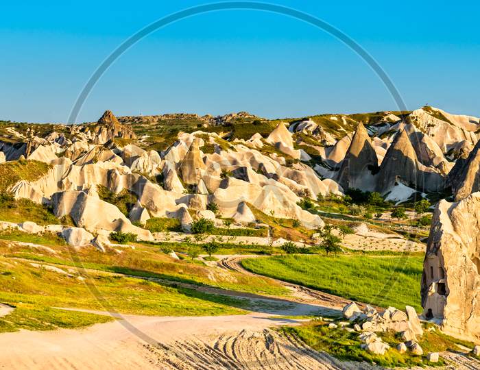 Rock Formations Of Rose Valley At Goreme National Park In Turkey