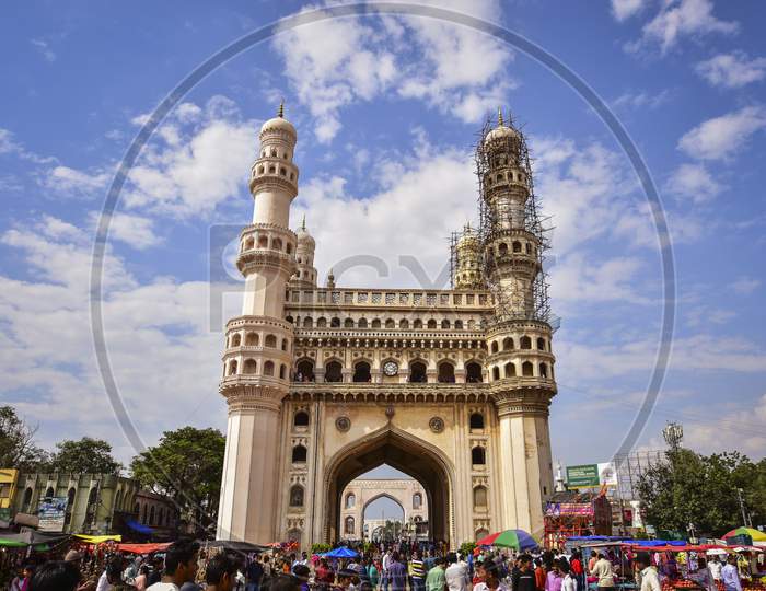 Charminar With Blue Sky And White Clouds As Background