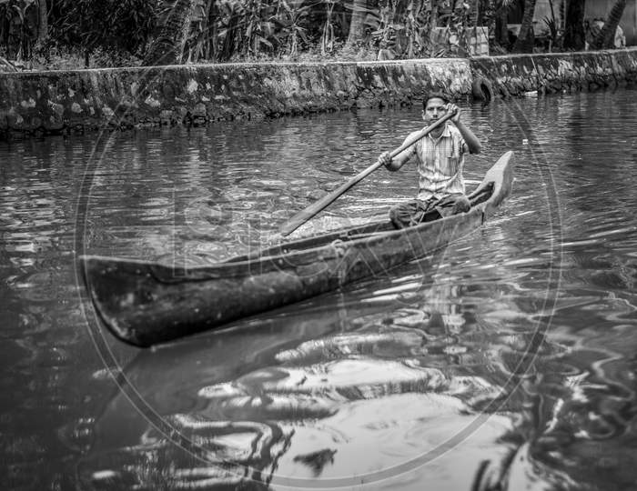 Rowing or Rafting Boats in Kerala Backwaters