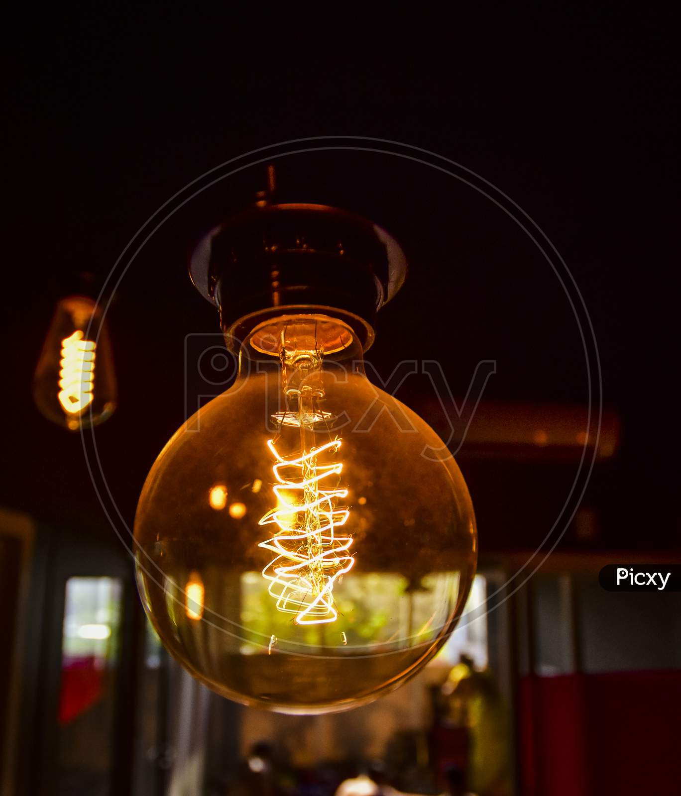 Eletric Filament Bulb  in a Cafe Interior