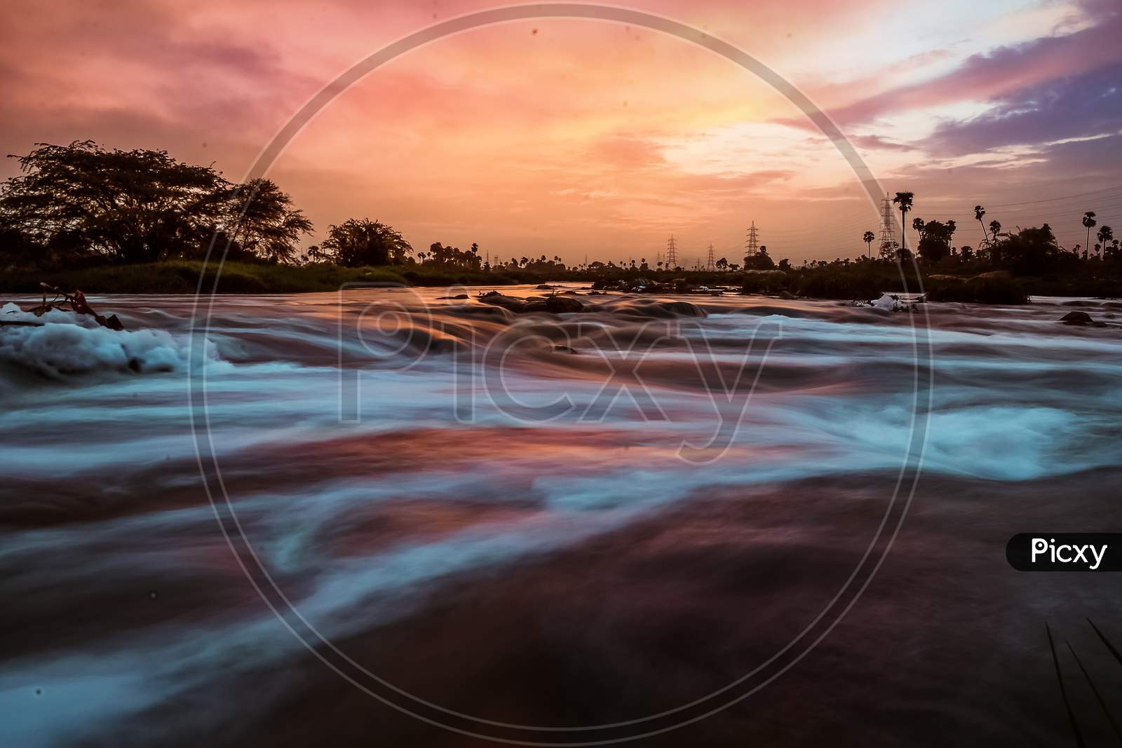 Long Exposure Of a Lake With Silky Smooth Water Flowing Texture