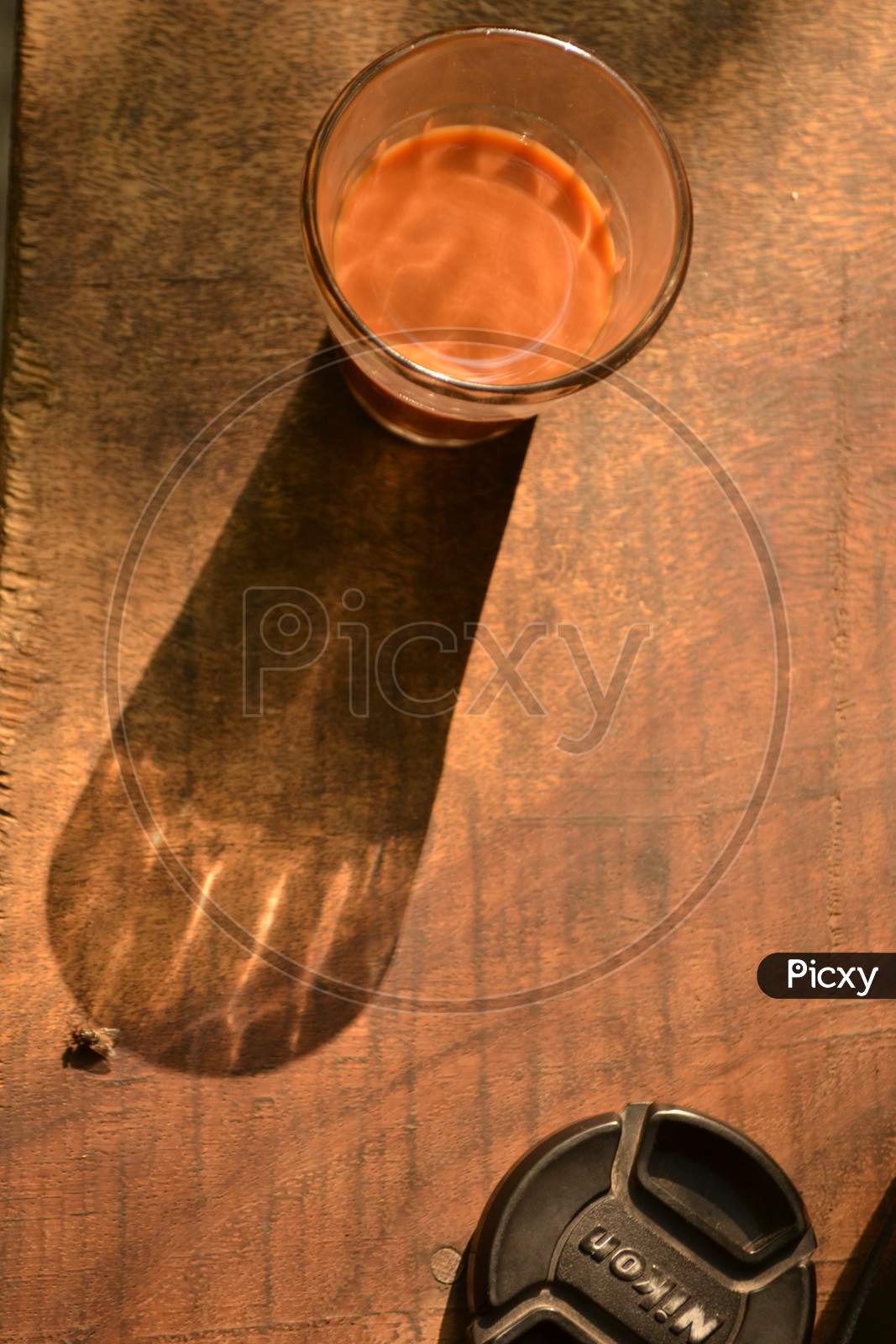 Tea Glass And Its Shadow