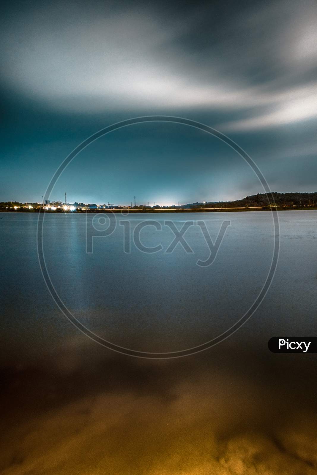 Long Exposure Of Lake Front With Smooth Texture