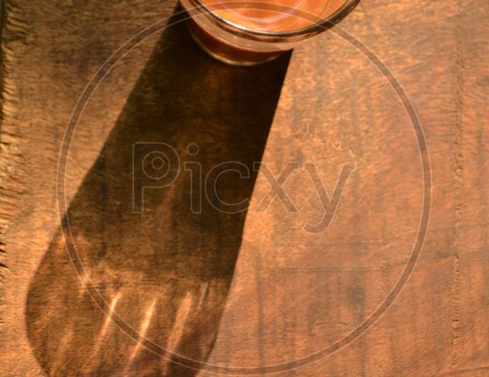Tea Glass And Its Shadow