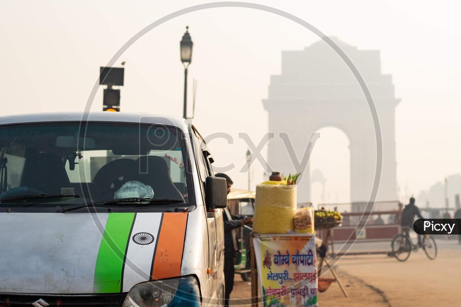 Indian Flag on a car in front of India Gate