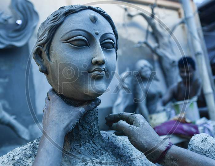 An Artist Prepares Idols Of Goddess Durga And Other Deities Inside A Workshop, Ahead Of Durga Puja Festival, In Guwahati, Assam, India On September 12, 2019.