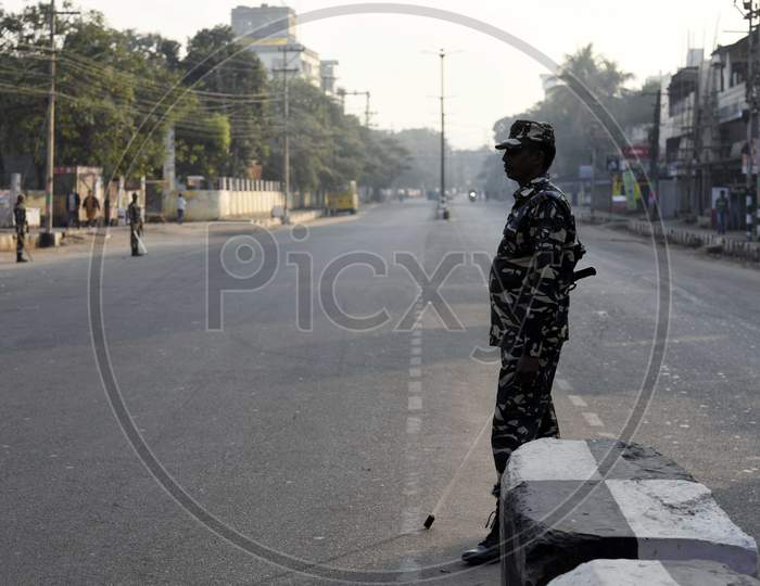 Security Personnel Patrol A Street During A Strike Called By All Assam Students’ Union (Aasu) And The North East Students’ Organisation (Neso) In Protest Against The Citizenship Amendment Bill, At Fancy Bazaar In Guwahati