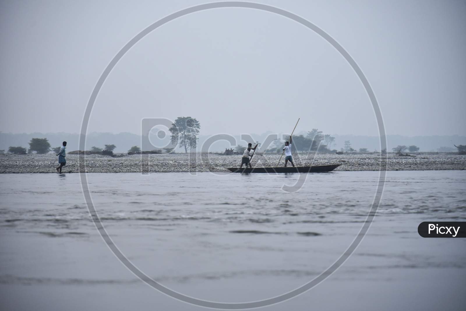 Fishermen In The Manas River In Baksa District Of Assam