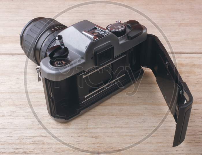 Vintage Film or Reel Camera On an Wooden Table