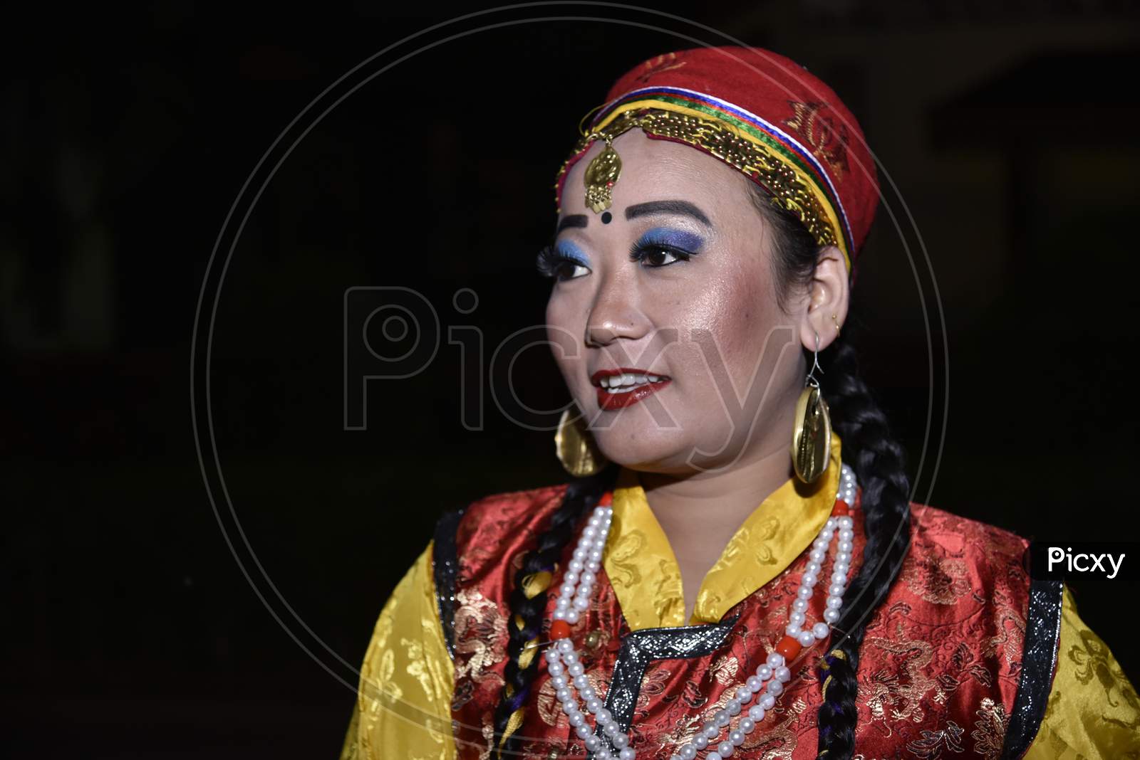 Assamese Woman In Traditional Assam tribal  Clothes During Bihu Festival Celebrations In Guwahati