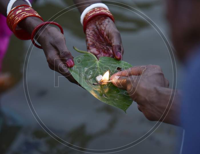 Hindu Devotees Offer Prayers During The Chhath Puja Festival At Barpeta Road Town In Barpeta District Of Assam In India,