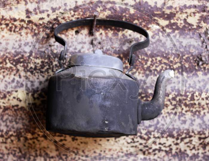 Tea Kettle Tagged To  Wall