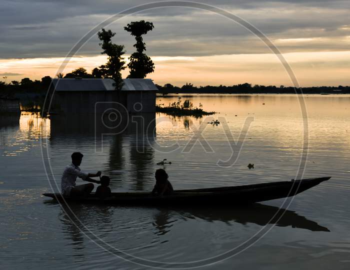 Silhouette of Fisherman Ob Bramhaputra River In Guwahati
