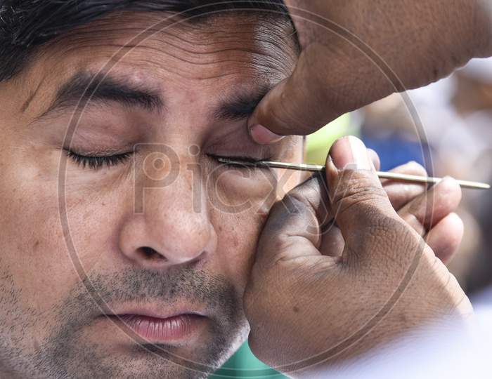 Eyes Cleaning Of a Man