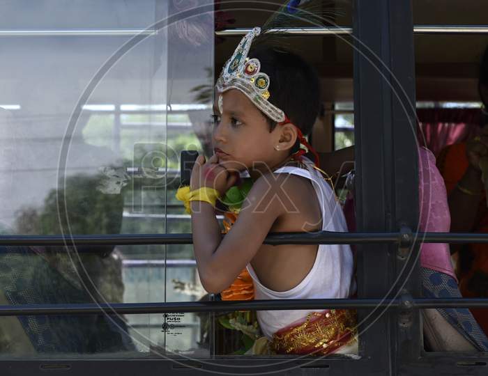 Little Children Dressed Up As Lord Krishna In A Bus During The Janmashtami Festival In Morigaon, Assam, India