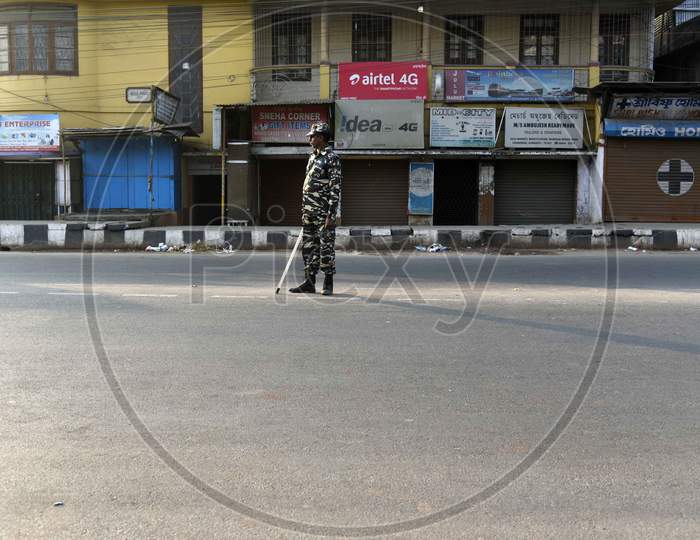 Security Personnel Patrol A Street During A Strike Called By All Assam Students’ Union (Aasu) And The North East Students’ Organisation (Neso) In Protest Against The Citizenship Amendment Bill, At Fancy Bazaar In Guwahati