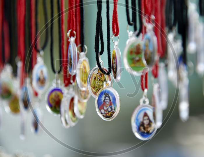 Lockets of Hindu God Selling in Vendor Stalls At Hindu Temples