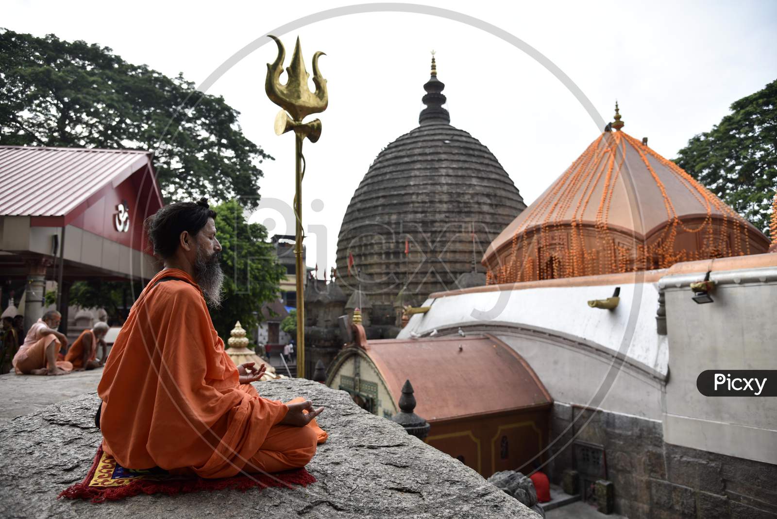 Hindu Holy Men Perform Yoga To Mark International Yoga Day At Kamakhya Temple In Guwahati In The Indian State Of Assam On June 21, 2019. Photo: Str