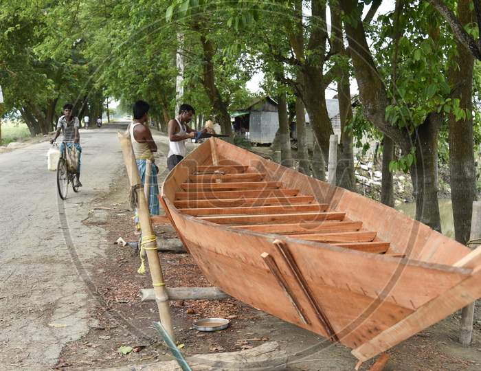 A Indian Man Making A Country-Made At Flood Affected Mayong Village In Morigaon District Of Assam