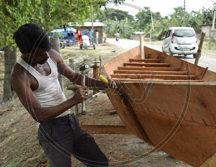A Indian Man Making A Country-Made At Flood Affected Mayong Village In Morigaon District Of Assam