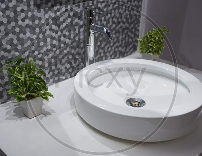 Wash Basin With Tap In an Toilet