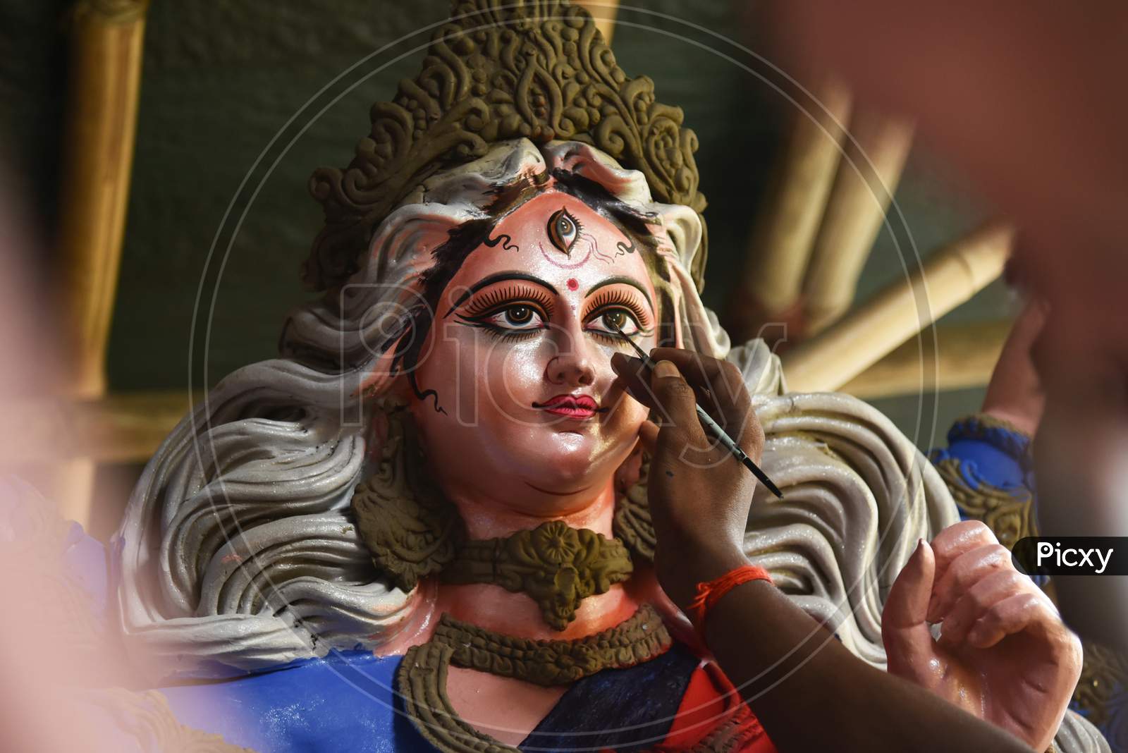 Artist Gives The Final Touches To An Idol Of The Goddess Durga Ahead Of Durga Puja Festival, In Guwahati, Assam, India