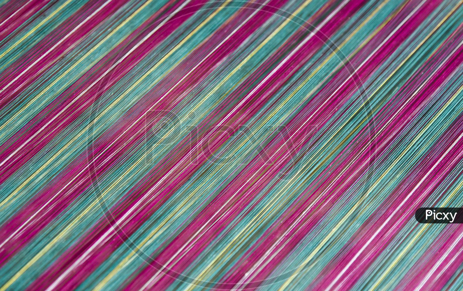Pattern Of Colourful Lines Closeup Forming a Background