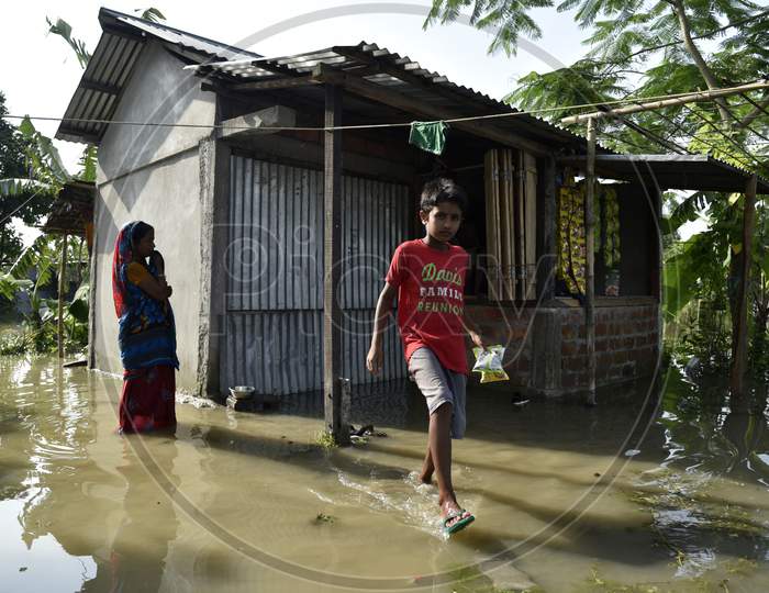 Assam People In Flood Filled Roads And Villages During Seasonal Floods in Guwahati Region