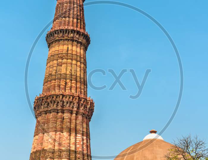 Alai Darwaza And Qutub Minar At The Qutb Complex In Delhi, India