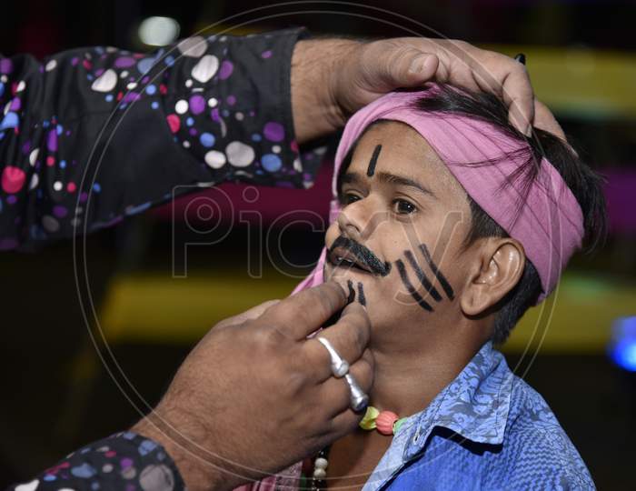 A Folk Artist Makeup To an  Assamese Boy During Bihu Festival Celebrations in Guwahati